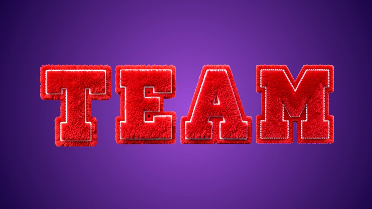 Texte 3D en fourrure rouge avec une ligne blanche dans un style sportif universitaire